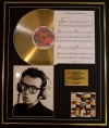 ELVIS COSTELLO/CD GOLD DISC, SONG SHEET & PHOTO DISPLAY/ALBUM BEST OF FIRST 10 YRS/SONGSHEET WATCHIN