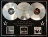 STATUS QUO/TRIPLE PLATINUM ALBUM DISPLAY/ROCKIN' ALL OVER THE WORLD + ROCK TIL YOU DROP + DON'T STOP